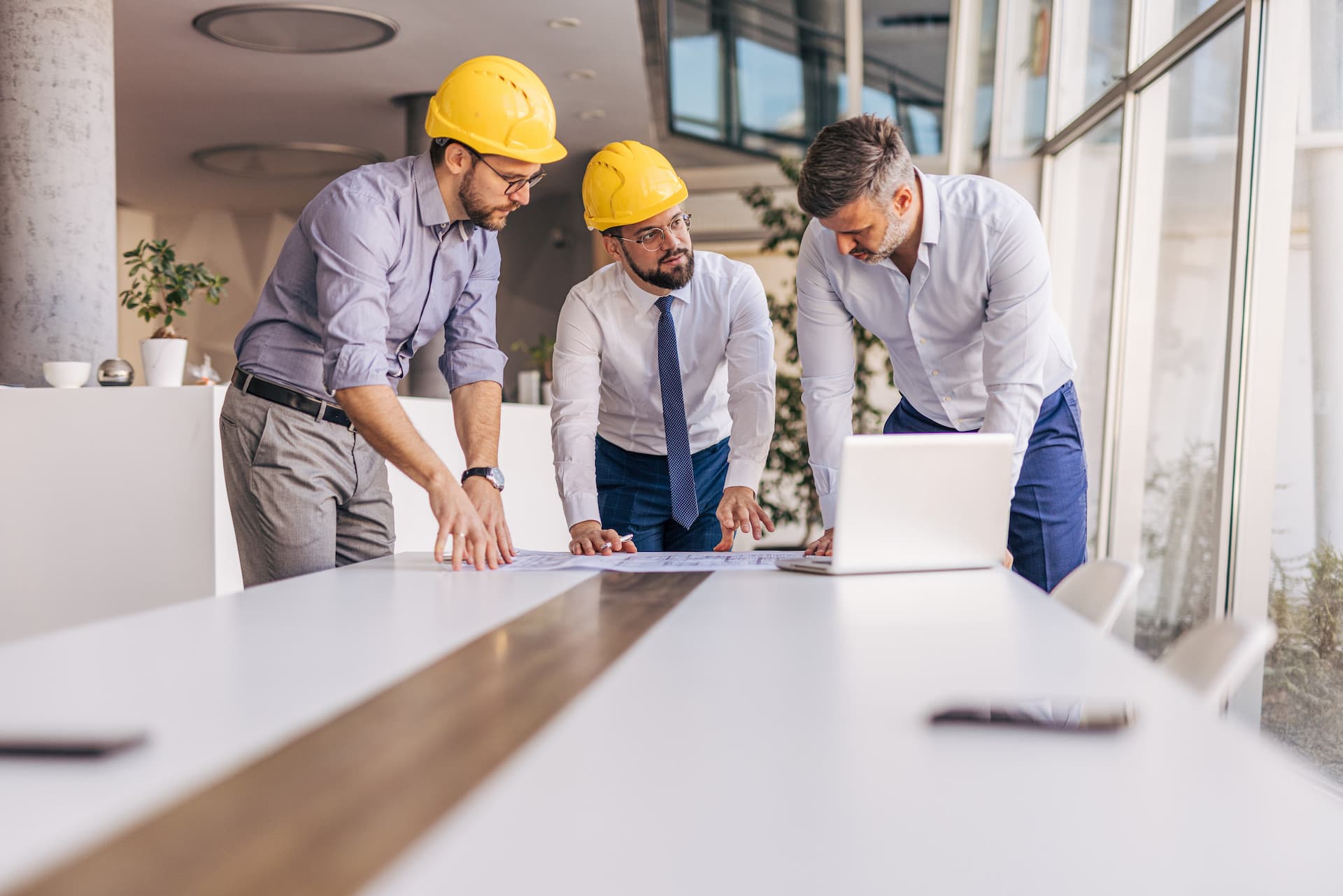 Team reviewing construction plans
